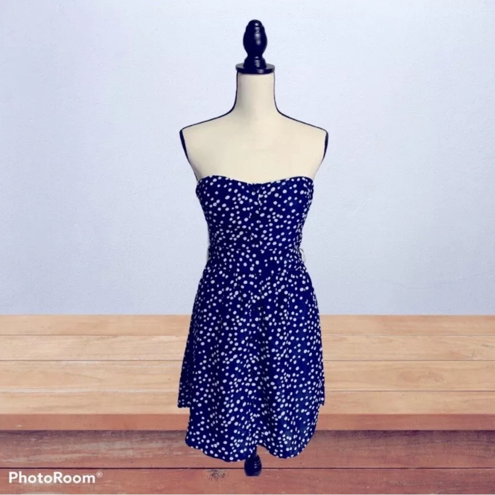 Papaya navy straplesss sweetheart dress with white polka dots, belt, and buttons